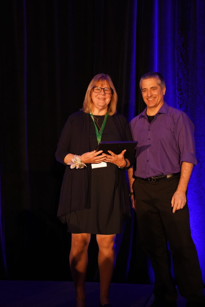 Membership Milestone Celebrated at Interaction 2023 shown with President at the time Oren Cheifetz