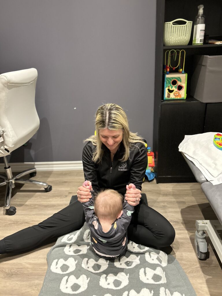 Natasha Weber, Physiotherapist with client for National Physiotherapy Month