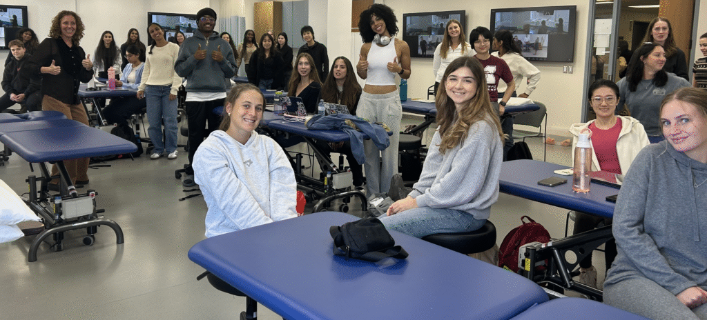 A group of University of Toronto Physical Therapy students in a classroom.